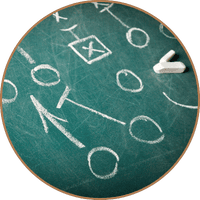 Chalkboard with white drawings of arrows, Xs and Os - representing Pattern Recognition 