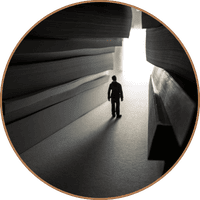 Person working through narrow valley between stacks of books, representing expertise through specialization