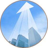 Commercial business buildings are pictured against a blue sky with a superimposed arrow pointing upward, symbolizing value