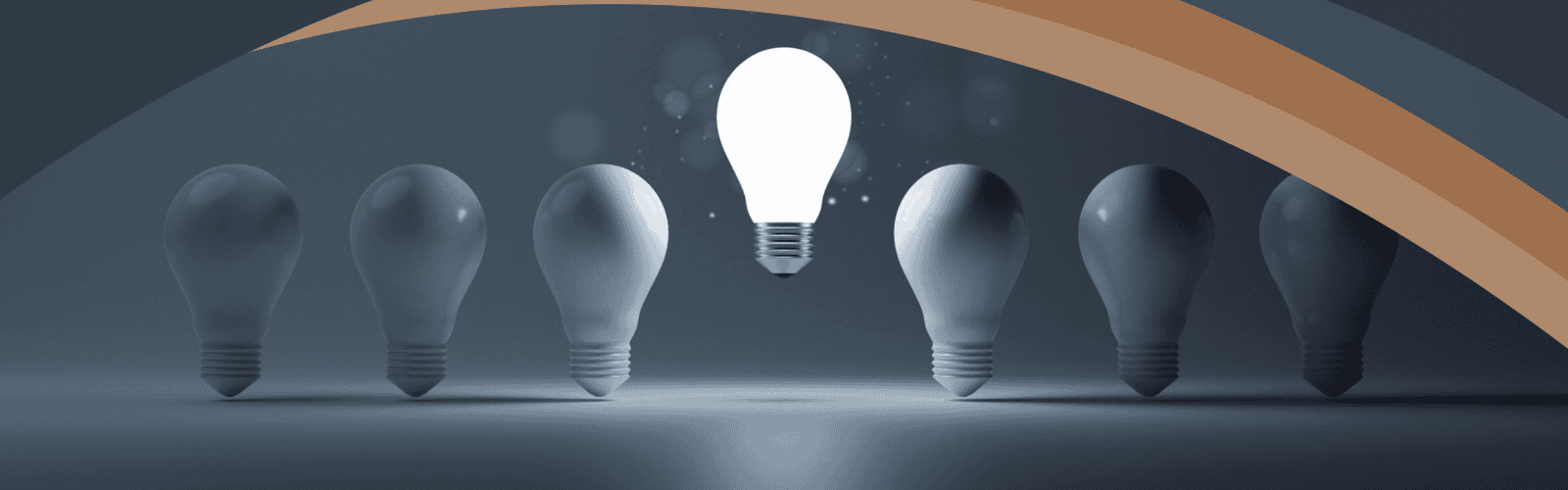 One lit lightbulb elevated above dark bulbs in a row, symbolizing Optimum Transitions' clear solutions and expert answers to frequently asked questions about business transitions